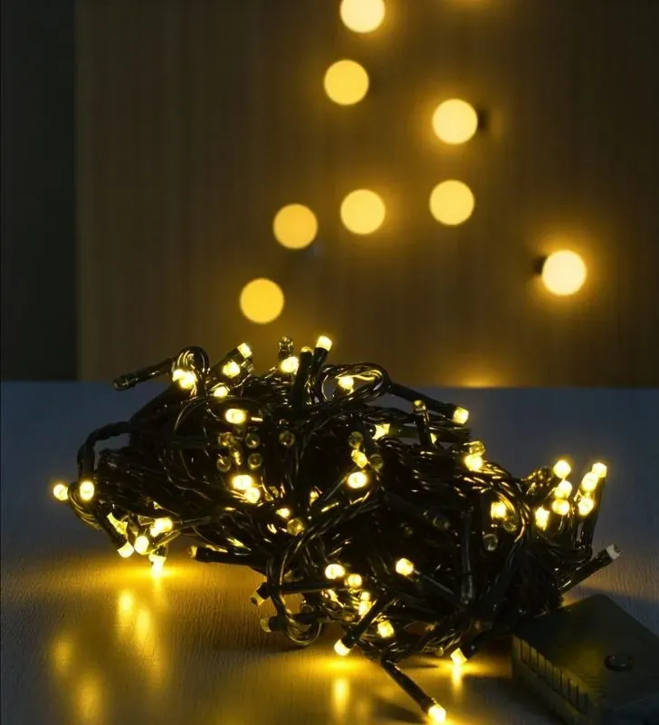 Serie Navideña Navicolors L564014 – 200 LED Luz Cálida Cable Verde