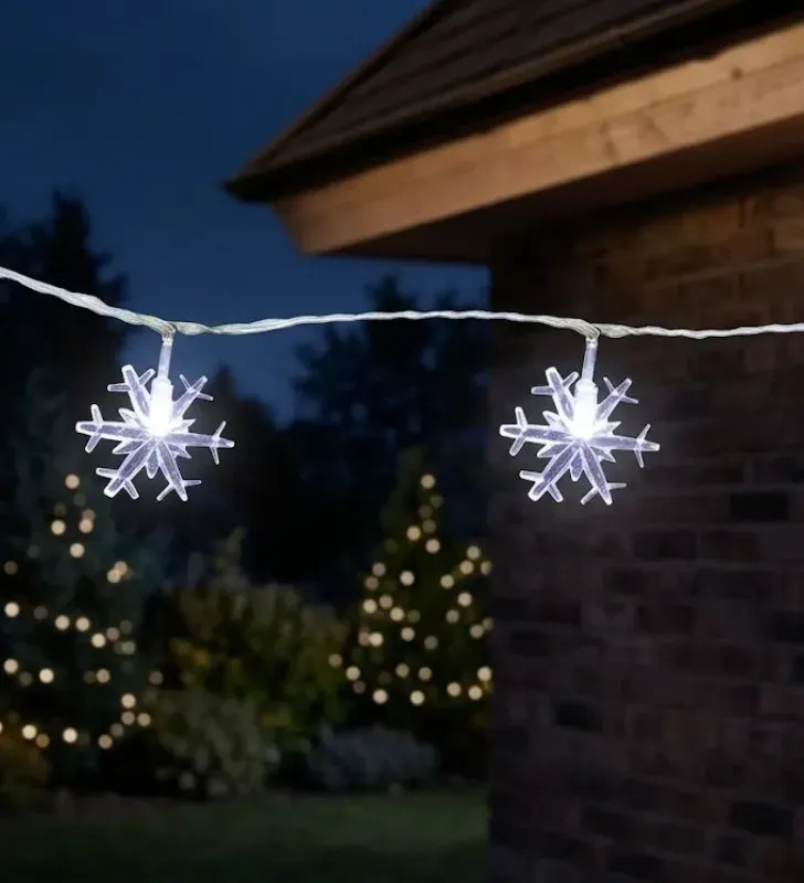 Serie 20 Copos de Nieve LED Blanco Frío 4m Cable Transparente L573135 | Navicolors