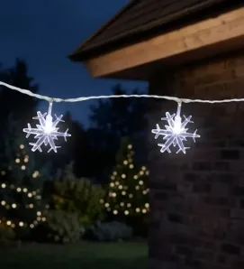 Serie 20 Copos de Nieve LED Blanco Frío 4m Cable Transparente L573135 | Navicolors